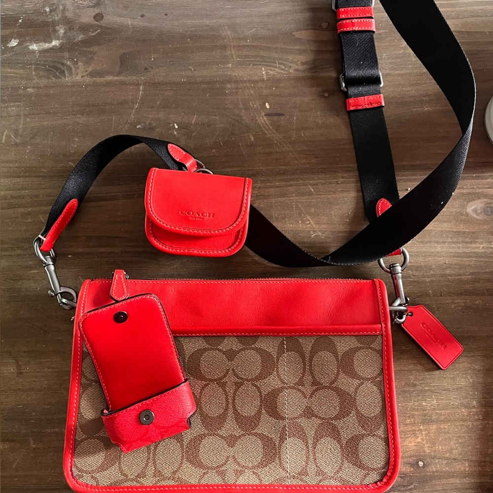 Cherry red trimmed logo Coach cross-body with separate AirPod holder